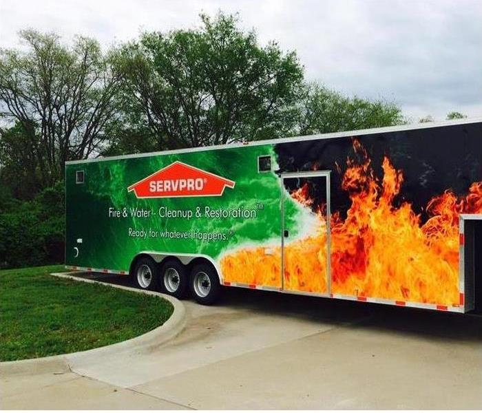 trailer with SERVPRO logo and fire decal